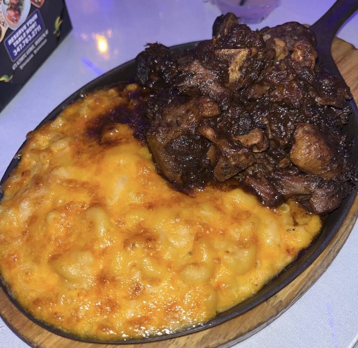 Tender slow-braised oxtails with macaroni and cheese at The Simpson Brooklyn - Best places to eat in New York City 2026